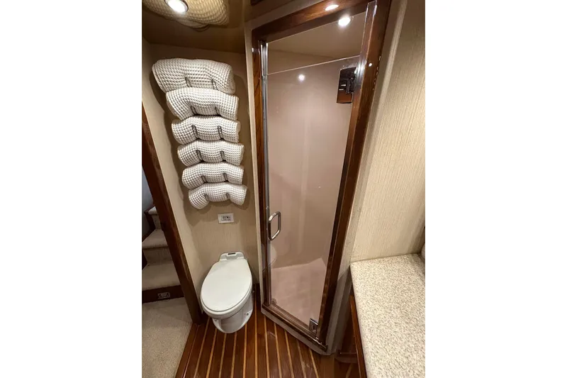 Baby Grand Yacht Photos Pics Bathroom interior of 2006 Egg Harbor 43 Sport Yacht with shower and toilet.