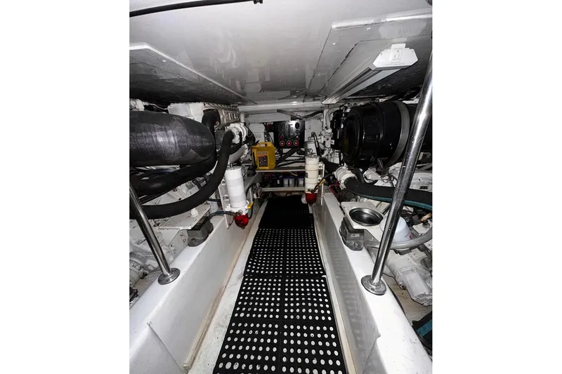 Baby Grand Yacht Photos Pics Engine room of a 2006 Egg Harbor 43 Sport Yacht, showcasing mechanical components.