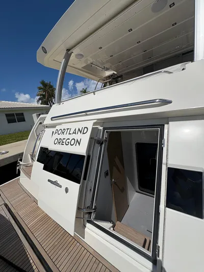  Yacht Photos Pics 2018 Prestige 680 yacht docked, featuring "Portland Oregon" text on the side.