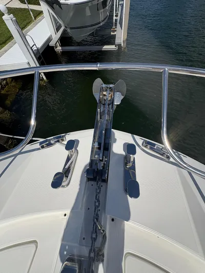  Yacht Photos Pics Bow of 2018 Prestige 680 yacht with anchor chain and railing.