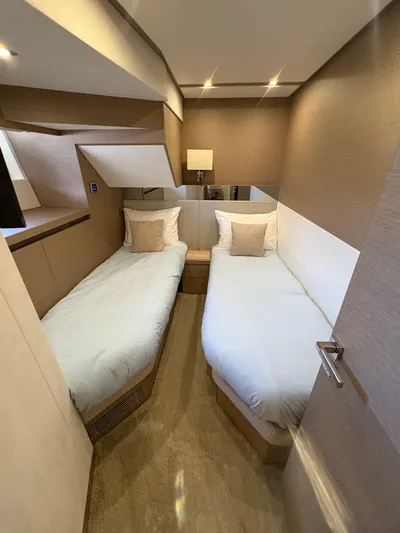  Yacht Photos Pics Twin bedroom in 2018 Prestige 680 yacht with modern decor and cozy lighting.