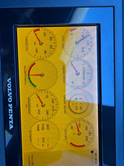  Yacht Photos Pics Volvo Penta engine display on a 2018 Prestige 680 yacht, showing various gauges and indicators.