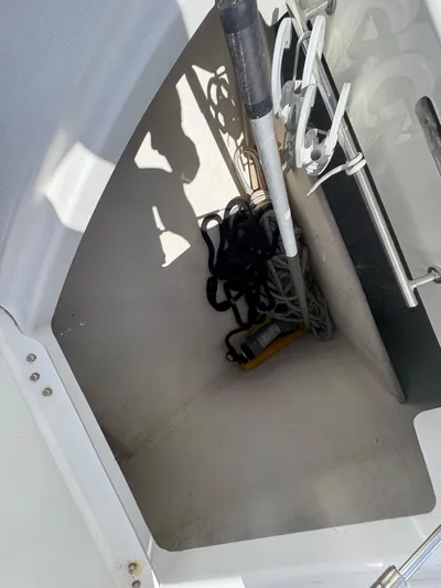  Yacht Photos Pics Storage compartment on a 2018 Prestige 680 yacht with ropes and equipment.