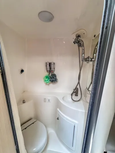  Yacht Photos Pics 2023 Regal 26 XO boat bathroom with shower and toilet.