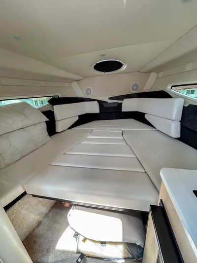  Yacht Photos Pics 2023 Regal 26 XO cabin interior with plush seating and modern design.