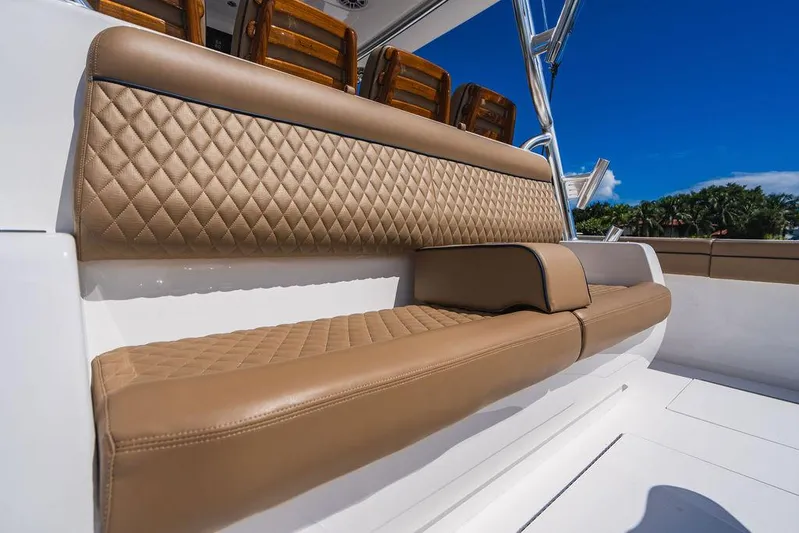  Yacht Photos Pics Luxurious seating on 2023 Valhalla Boatworks V-46 with diamond-stitched upholstery.
