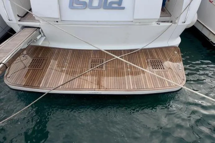  Yacht Photos Pics Luxury Sanlorenzo 62 yacht, 2008 model, with elegant teak swim platform.