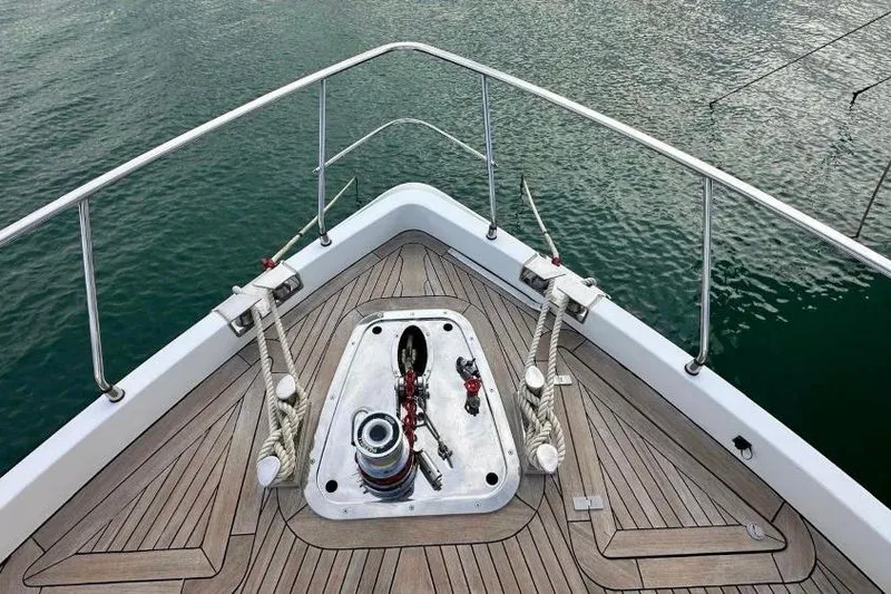  Yacht Photos Pics Bow of 2008 Sanlorenzo 62 yacht with teak deck and anchor system.