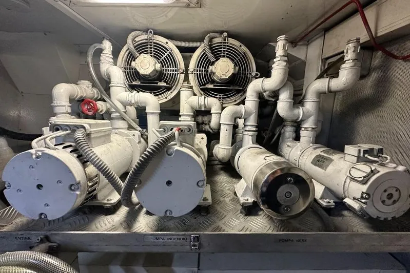  Yacht Photos Pics Engine room of 2008 Sanlorenzo 62 yacht with mechanical equipment and piping.