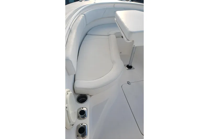  Yacht Photos Pics 2015 Edgewater 320CC boat interior with white seating and cup holders.