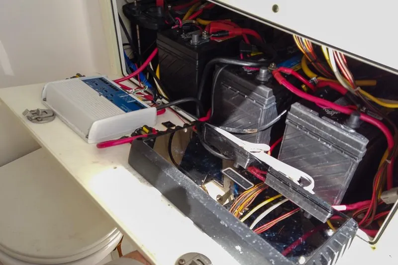  Yacht Photos Pics Electrical system of a 2015 Edgewater 320CC boat with batteries and wiring.