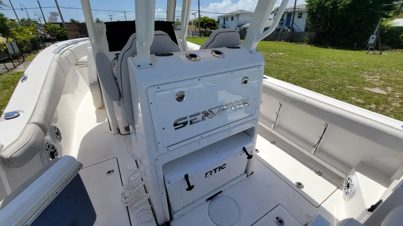  Yacht Photos Pics 2024 Sea Fox 288 Commander boat interior with seating and storage compartments.