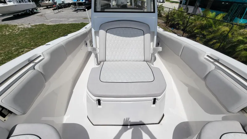  Yacht Photos Pics 2024 Sea Fox 288 Commander boat interior with cushioned seating and spacious layout.