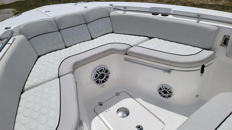  Yacht Photos Pics Luxurious seating area on 2024 Sea Fox 288 Commander boat with stylish upholstery and speakers.