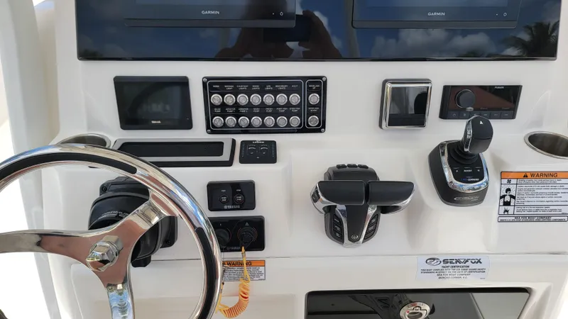  Yacht Photos Pics 2024 Sea Fox 288 Commander helm with Garmin displays and control panel.