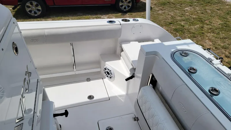  Yacht Photos Pics 2024 Sea Fox 288 Commander boat interior with seating and storage compartments.