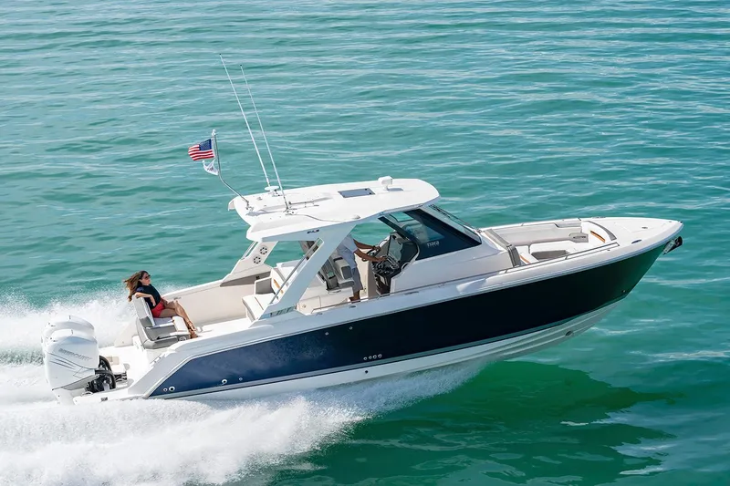  Yacht Photos Pics Manufacturer Provided Image: 2022 Tiara Yachts 34 LS cruising on open water.