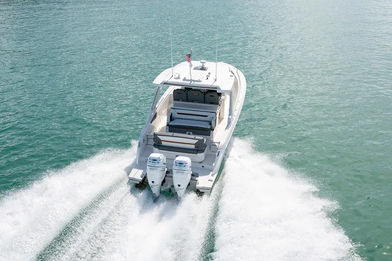  Yacht Photos Pics Manufacturer Provided Image: 2022 Tiara Yachts 34 LS cruising on open water.