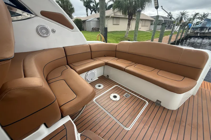 Yacht Photos Pics 2009 Formula 40 Performance Cruiser with brown leather seating and teak flooring.