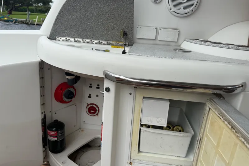  Yacht Photos Pics 2009 Formula 40 Performance Cruiser interior with storage and control panel.