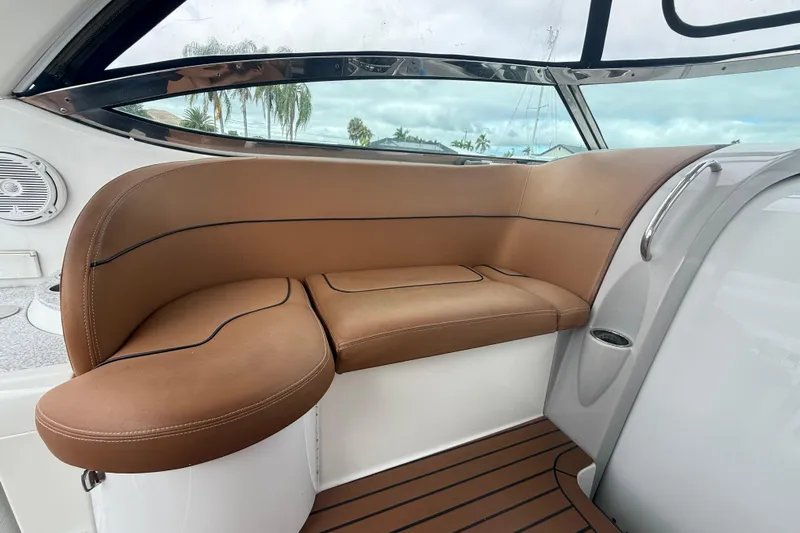  Yacht Photos Pics Luxurious tan seating in 2009 Formula 40 Performance Cruiser boat interior.