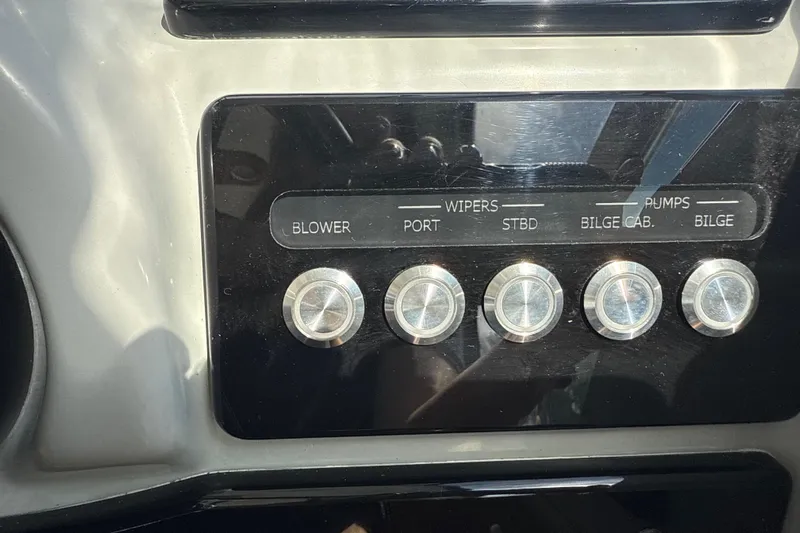  Yacht Photos Pics Control panel of a 2009 Formula 40 Performance Cruiser with labeled buttons.