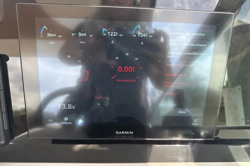  Yacht Photos Pics Garmin display on 2009 Formula 40 Performance Cruiser showing engine metrics and settings.