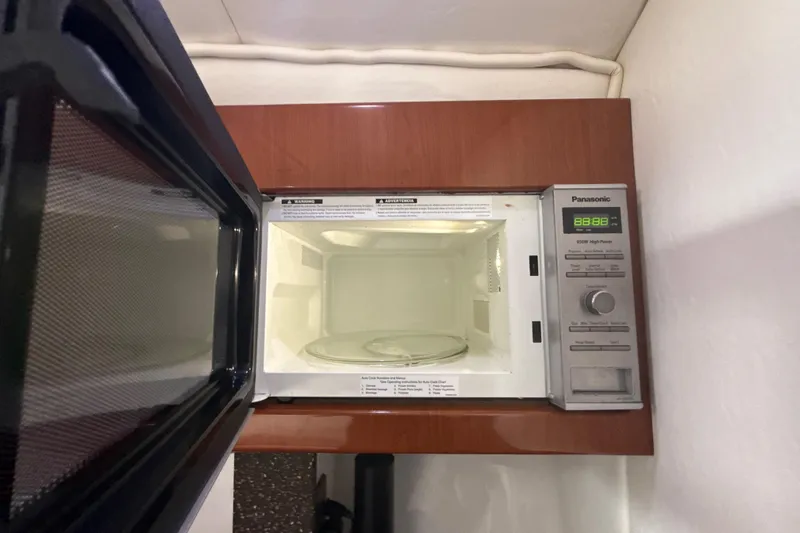  Yacht Photos Pics Open Panasonic microwave in a 2009 Formula 40 Performance Cruiser kitchen.