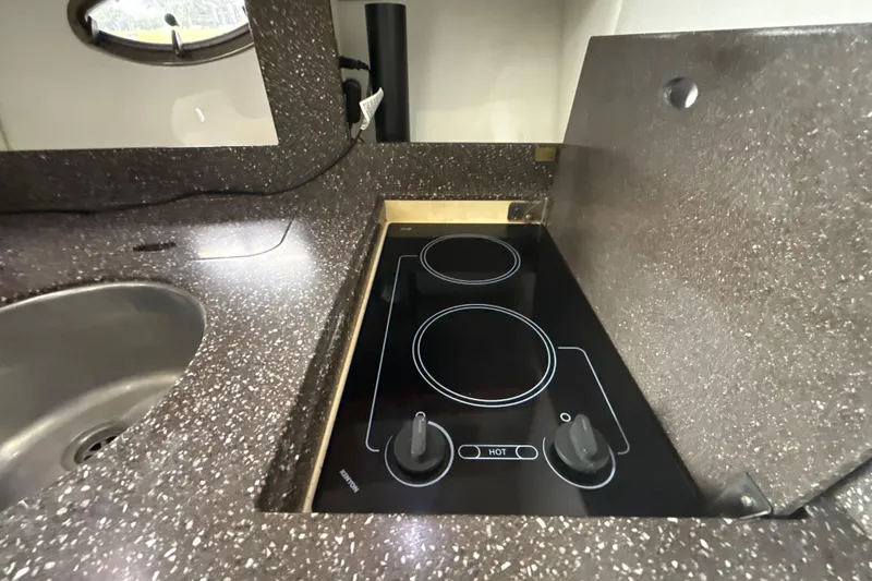  Yacht Photos Pics 2009 Formula 40 Performance Cruiser kitchen with electric stovetop and sink.