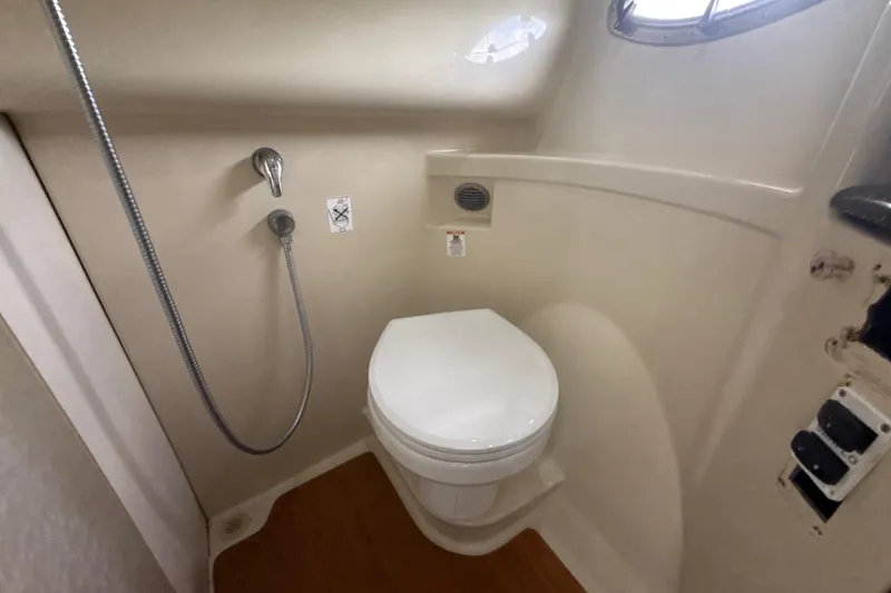  Yacht Photos Pics 2009 Formula 40 Performance Cruiser bathroom with toilet and showerhead.