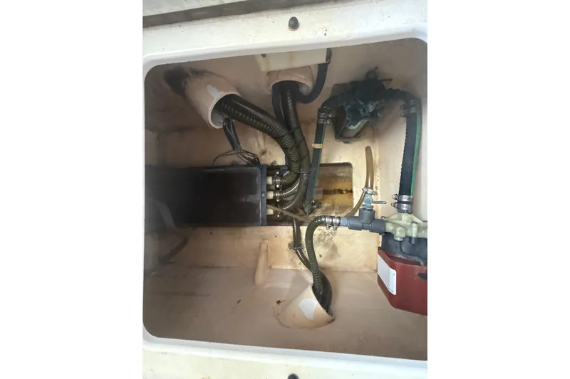  Yacht Photos Pics Engine compartment of a 2009 Formula 40 Performance Cruiser with visible hoses and components.