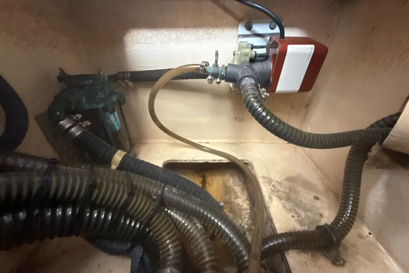  Yacht Photos Pics Engine compartment of a 2009 Formula 40 Performance Cruiser with hoses and mechanical components.