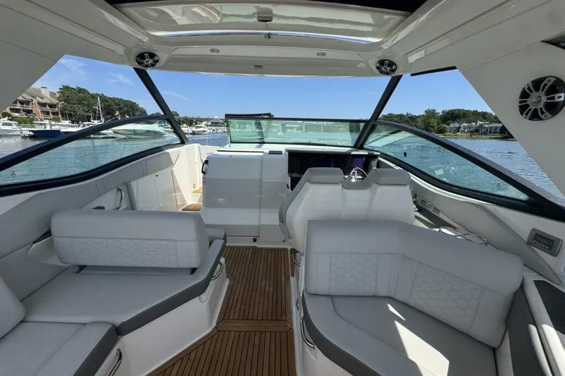  Yacht Photos Pics 2020 Sea Ray Sundancer 320 Outboard interior with luxurious seating and modern design.