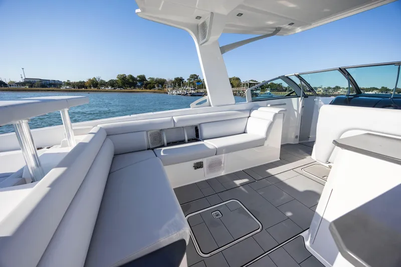  Yacht Photos Pics Luxurious 2023 Aviara AV32 OB boat interior with spacious seating and modern design on the water.