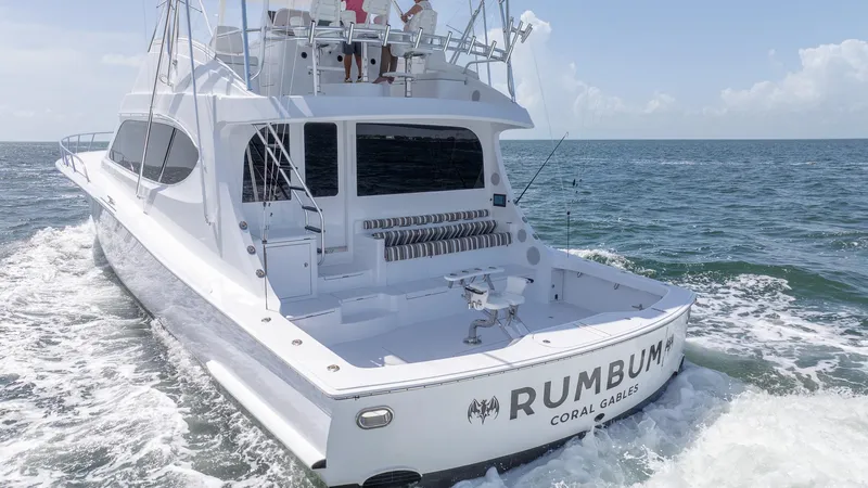  Yacht Photos Pics 2024 Hatteras GT70 yacht cruising on open water.