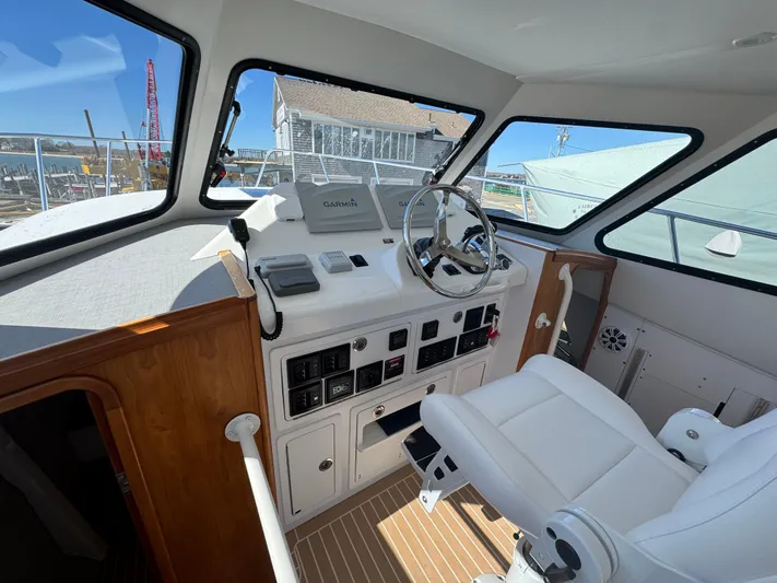 Resolute Yacht Photos Pics Interior of 2020 Cape Powercat 3500 PH boat with modern helm and seating.