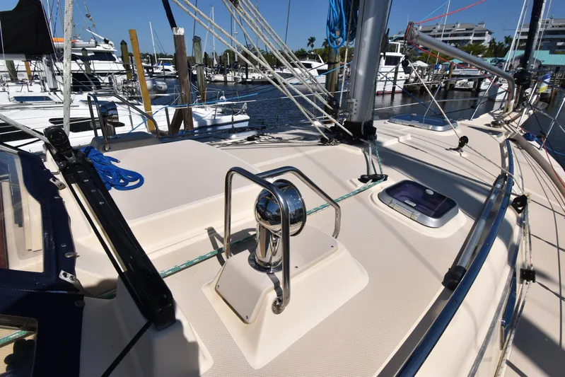 Offline Yacht Photos Pics 2019 Island Packet 349 sailboat deck with winch and rigging in marina.