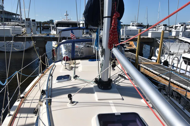Offline Yacht Photos Pics 2019 Island Packet 349 sailboat docked at marina, showcasing deck and rigging.