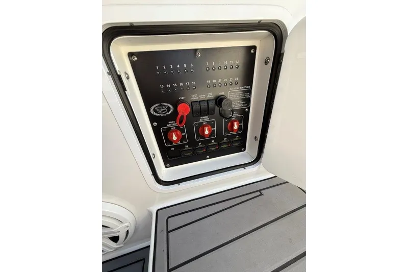  Yacht Photos Pics Control panel of a 2019 Cobalt A36 boat with switches and dials.