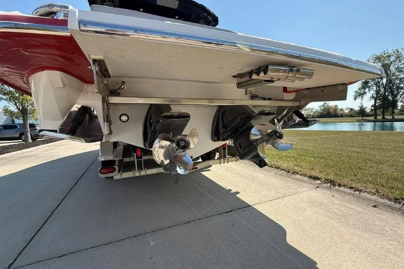  Yacht Photos Pics 2019 Cobalt A36 boat stern with dual propellers on a sunny day.