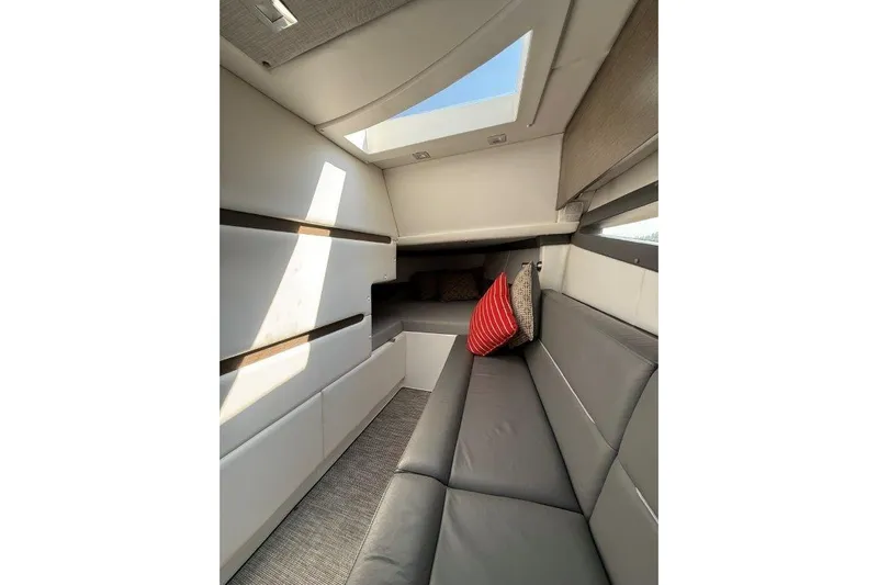  Yacht Photos Pics Luxurious interior of 2019 Cobalt A36 boat with skylight and modern seating.