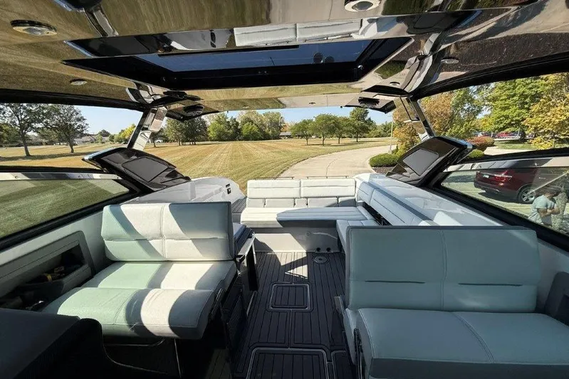  Yacht Photos Pics 2019 Cobalt A36 boat interior with spacious seating and open sunroof.
