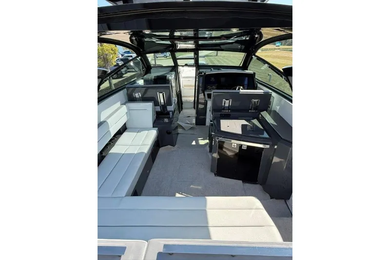  Yacht Photos Pics Interior of a 2019 Cobalt A36 boat with modern seating and sleek design.