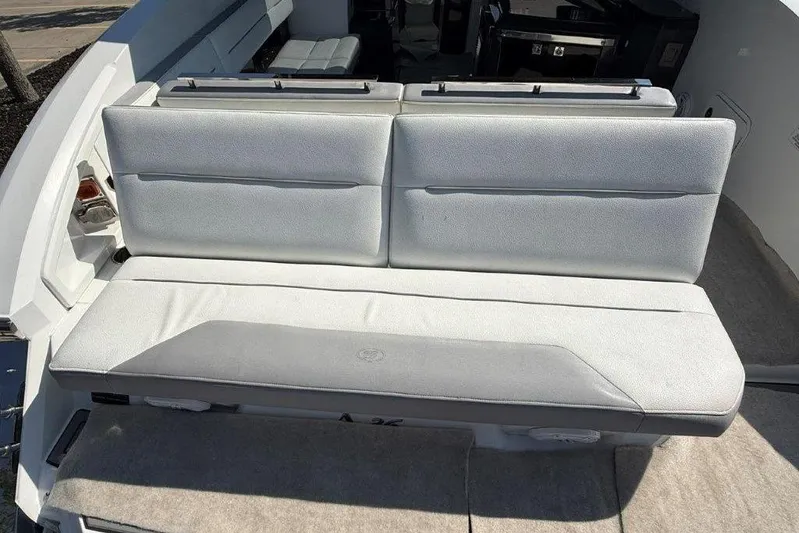  Yacht Photos Pics 2019 Cobalt A36 boat interior with white cushioned seating.