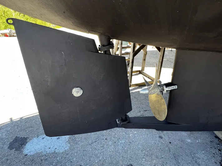 Melodeon Yacht Photos Pics Rudder and propeller of 2006 Seakindly Marine Tucker 52 boat on dry dock.
