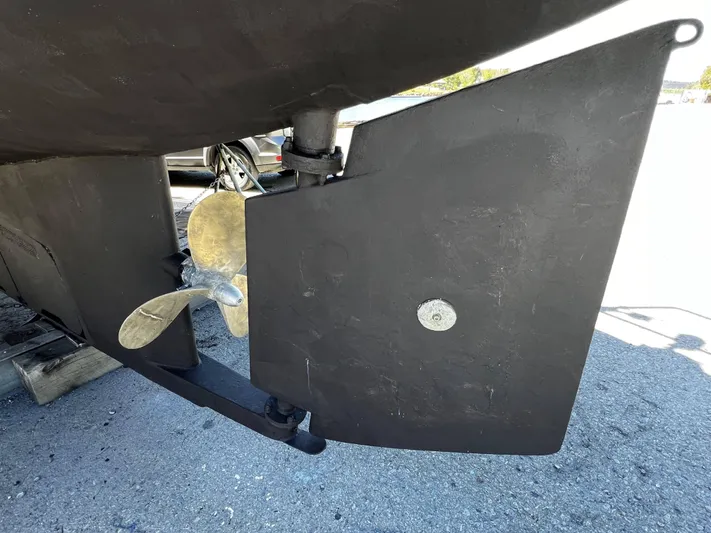 Melodeon Yacht Photos Pics Propeller and rudder of 2006 Seakindly Marine Tucker 52 boat on dry dock.