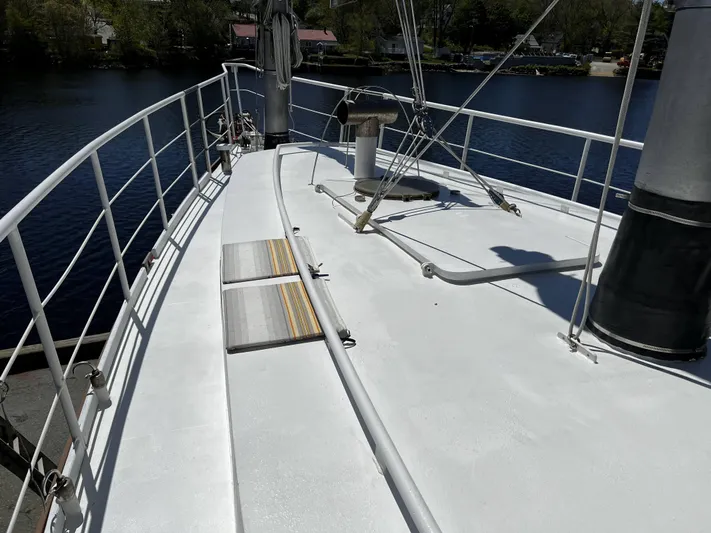 Melodeon Yacht Photos Pics Deck view of 2006 Seakindly Marine Tucker 52 sailboat, featuring railing and mast.