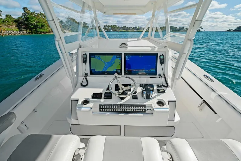Ohana Yacht Photos Pics 2019 Invincible 42 Open Fisherman boat cockpit with dual navigation screens.
