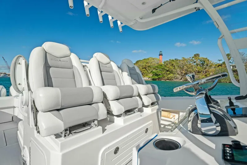 Ohana Yacht Photos Pics Luxurious seating on the 2019 Invincible 42 Open Fisherman boat with scenic water view.