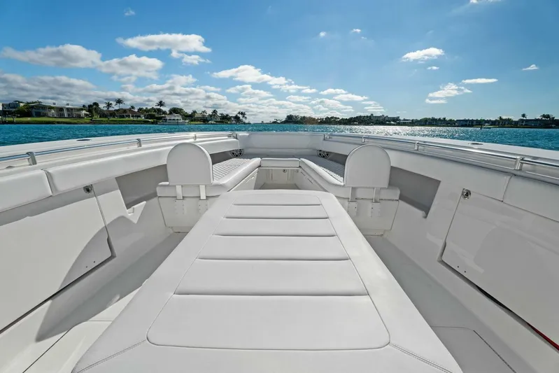 Ohana Yacht Photos Pics 2019 Invincible 42 Open Fisherman boat interior with white seating and ocean view.
